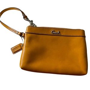 Coach wristlet,  Caramel, Zip corner closure.